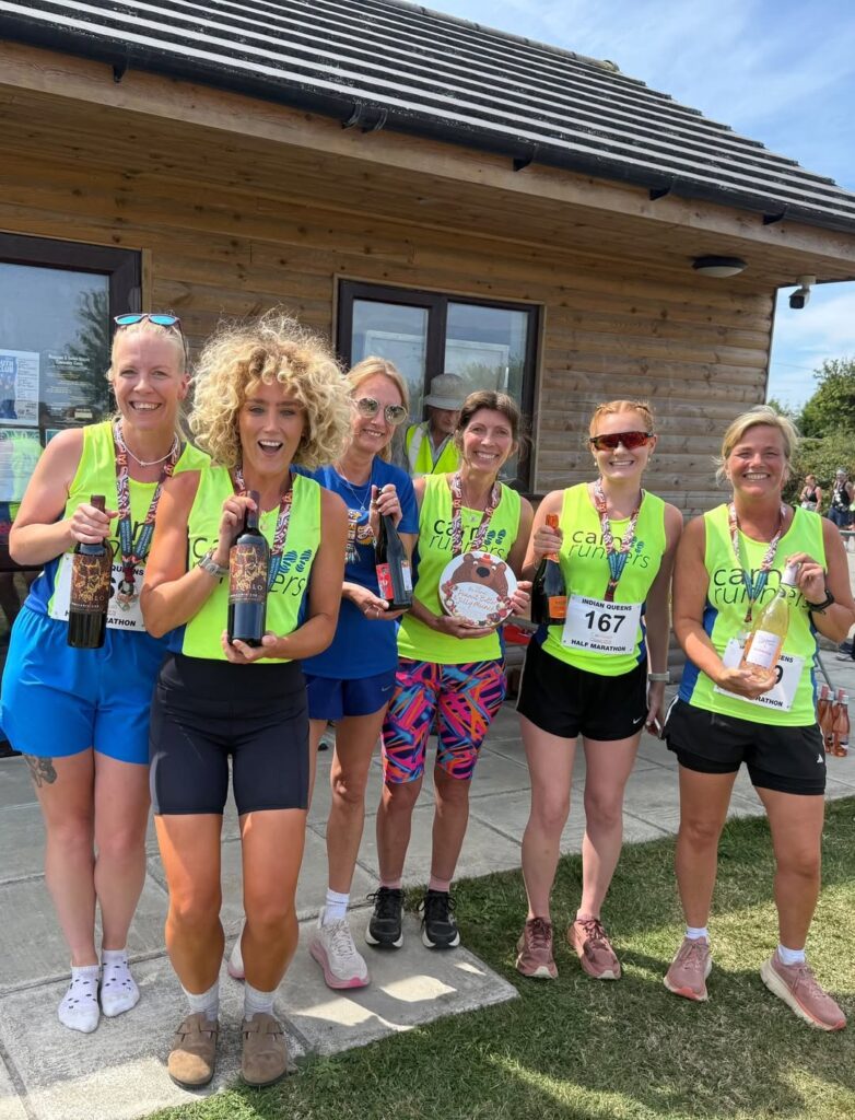 Carn Runners celebrating after the 2026 Indian Queens Half Marathon