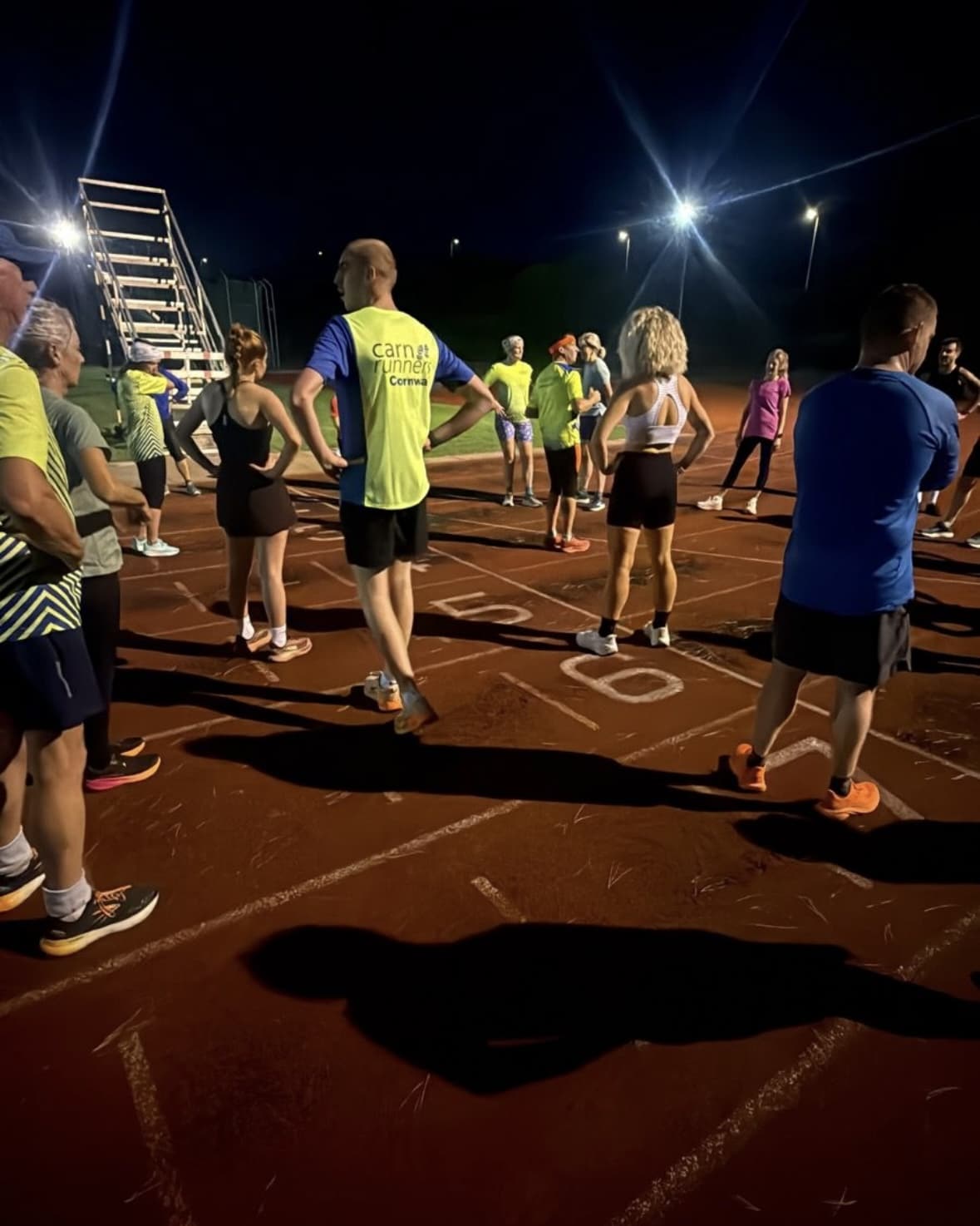 Runners taking part in a track interval session