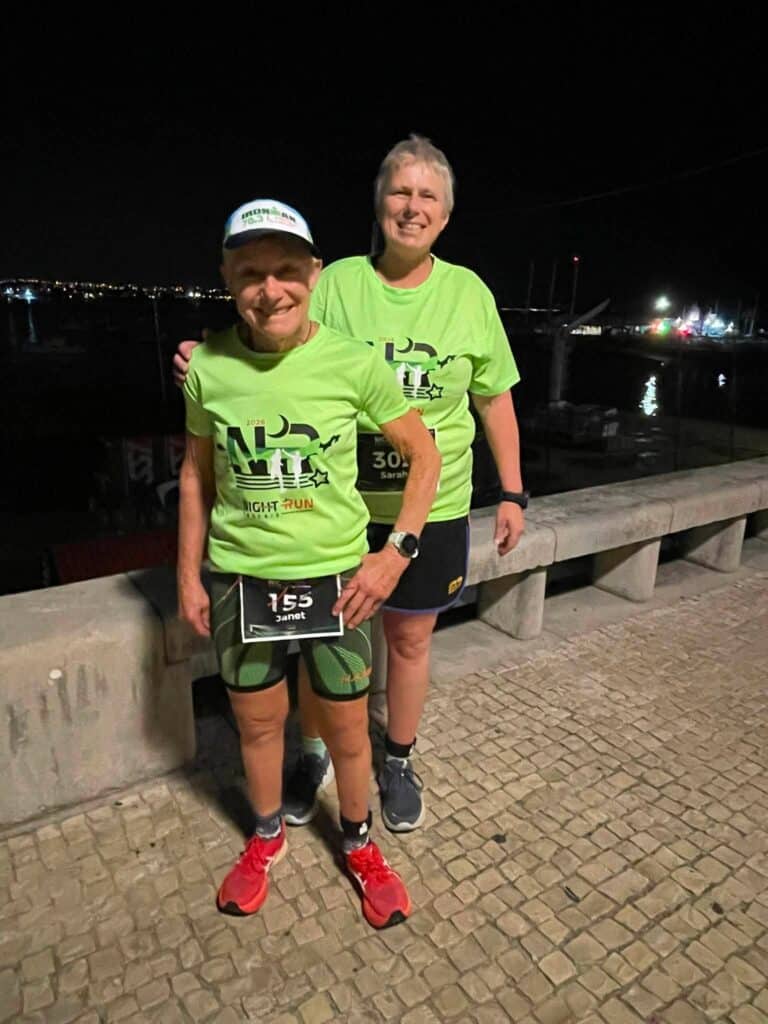 Evening running scene beside a marina in Cascais